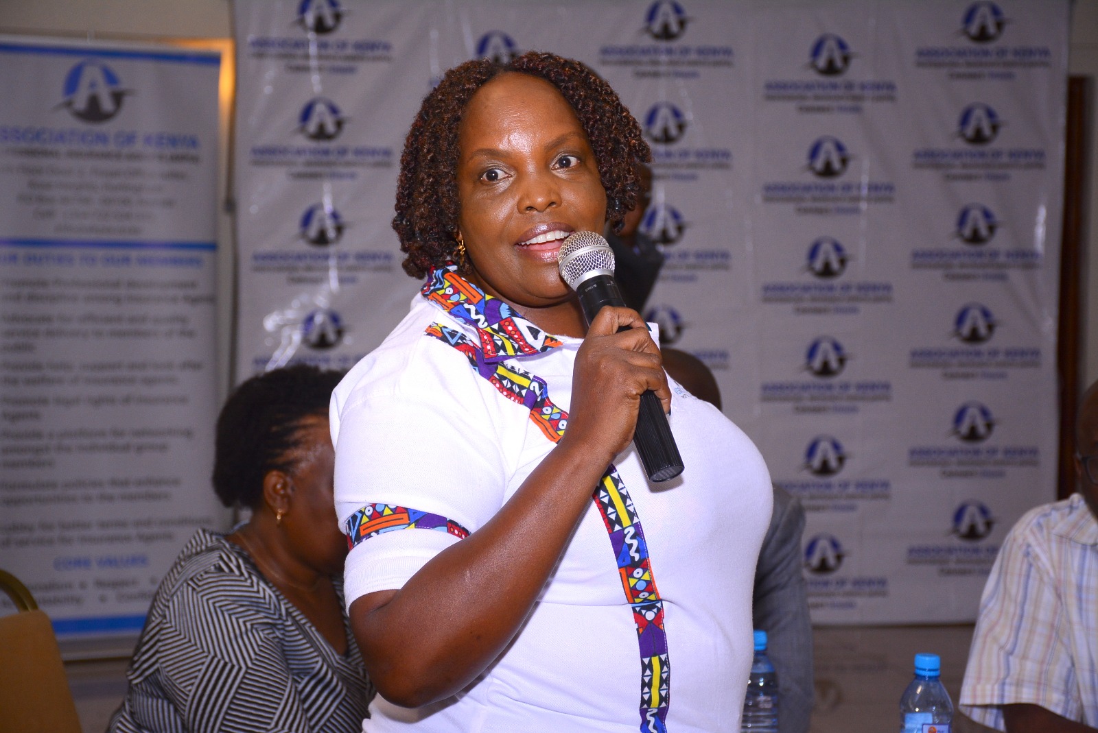 Maggie Kahiga addressing AKPIA members